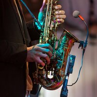 Man Playing Saxophone Hands With Instrument In Fr 2023 11 27 05 33 34 Utc